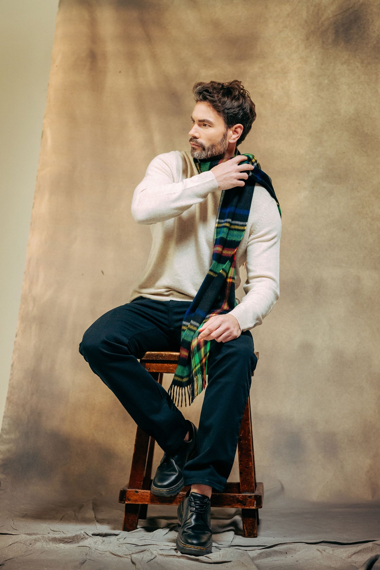 Male model wearing 100% Cashmere Scarf - Black x Yellow x Red x Green