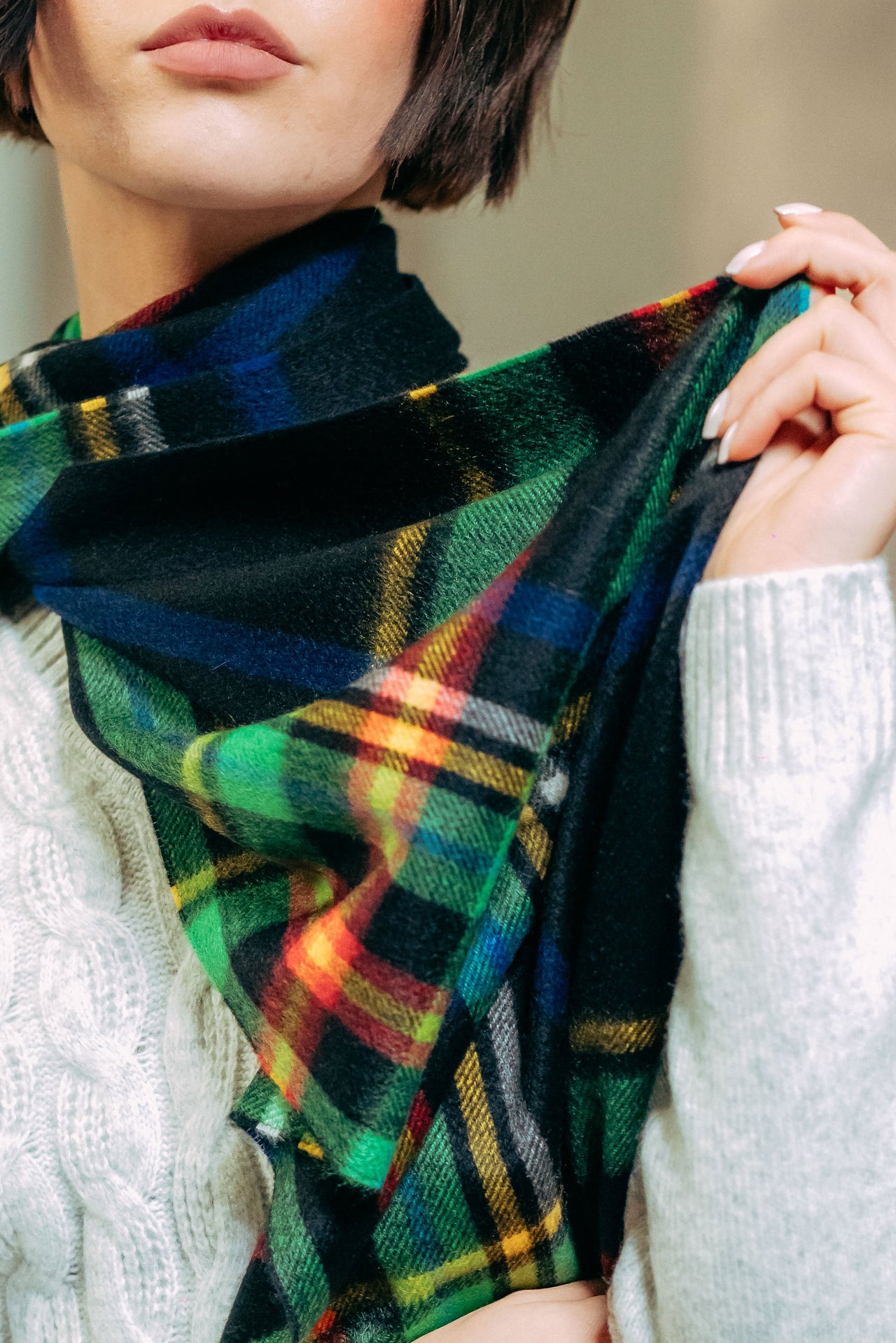 Female model wearing 100% Cashmere Scarf - Black x Yellow x Red x Green