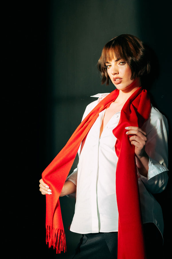 Female model wearing Classic Plain 100% Lambswool Scarf in Red